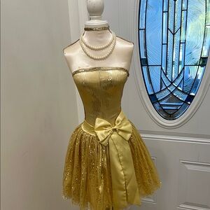 Mannequin with pearl Nicholas and Gold Sequin Strapless Dress with Bow